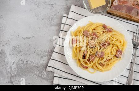 Spaghetti carbonara with pancetta and pecorino romano cheese Stock Photo