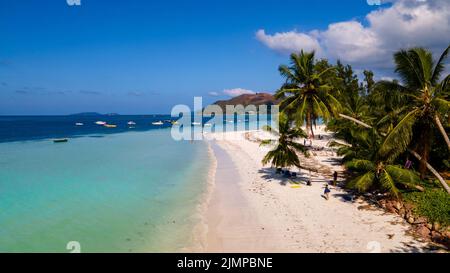 Praslin Seychelles tropical island with withe beaches and palm trees, beach of Anse Volbert Seychelles Stock Photo