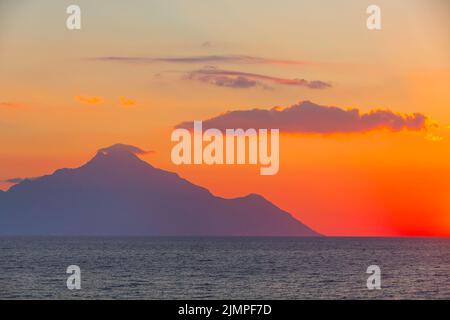Silhouette of mount Athos at sunrise, Greece Stock Photo