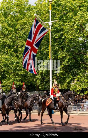 British Army Soldiers On Horseback Take Part In The Queen's Birthday Parade By Riding Along The Mall To Horse Guards Parade For The Trooping The Colou Stock Photo
