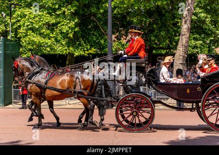 Members Of The British Royal Family Return Along The Mall In A Horse Drawn Carriage After Attending The Trooping The Colour Ceremony, London, UK. Stock Photo