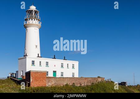 The current lighthouse at Flamborough Head on the East Yorkshire coast was built in 1806, and replaced the old lighthouse which was built in 1674. Stock Photo