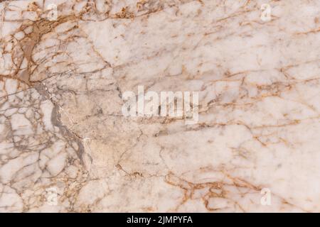 White Marble Texture With Some Orange Enclosure Stock Photo