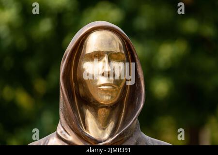 Budapest, Hungary -August 7, .2022:  Portrait of the statue of Satoshi Nakamoto mysterious founder of Bitcoin and Blockchain technology in; created by Stock Photo