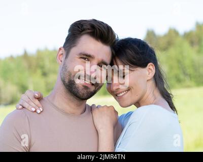 Portrait of mid adult happy smiling couple at countryside Stock Photo