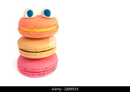 A funny monster with eyes made of macarons. Stock Photo