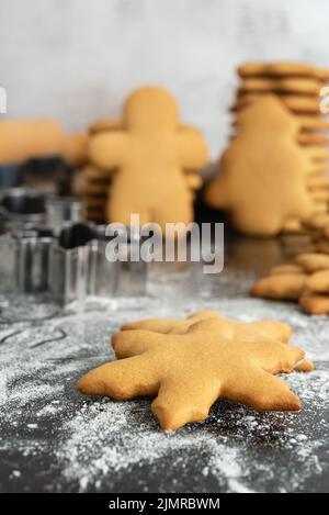 Homemade Christmas gingerbread cookies on the kitchen table. Stock Photo