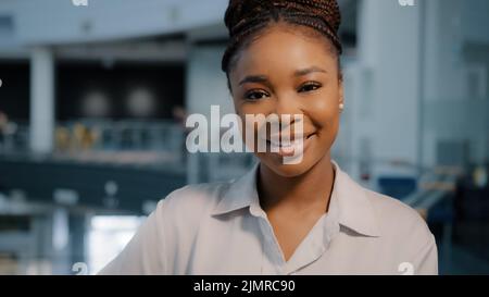 African american smiling businesswoman professional specialist student teacher manager female lawyer woman smile face looking camera posing at Stock Photo