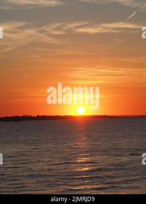 Sheerness, Kent, UK. 7th Aug, 2022. UK Weather: sunset in Sheerness, Kent.  Credit: James Bell/Alamy Live News Stock Photo
