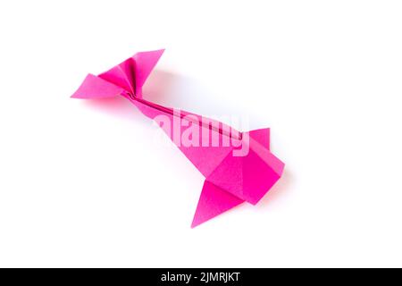 Pink paper fish origami isolated on a white background Stock Photo