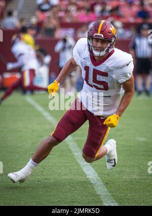 Washington Commanders wide receiver Dax Milne (15) runs up the field during  an NFL pre-season football game against the Cleveland Browns, Friday, Aug.  11, 2023, in Cleveland. (AP Photo/Kirk Irwin Stock Photo 