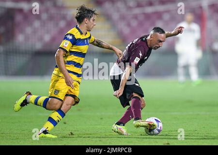 Salerno, Italy. 07th Aug, 2022. Franck Ribery of US Salernitana 1919 and Adrian Bernabe' of Parma Calcio 1913 compete for the ball during the Italian Cup match between US Salernitana 1919 and Parma Calcio 1913 at Stadio Arechi, Salerno, Italy on 7 August 2022. Credit: Giuseppe Maffia/Alamy Live News Stock Photo