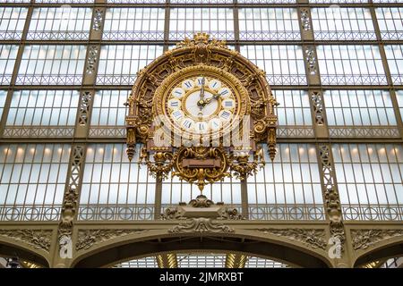 Paris, France, March 28 2017: Golden clock of the museum D'Orsay.The Musee d'Orsay is a museum in Paris, on the left bank of the Stock Photo