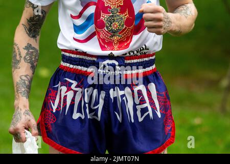 Moscow, Russia. 7th of August, 2022. Muay Thai athlete is at a stage during Thai Festival in Moscow 2022, at Hermitage Garden in Moscow, Russia. Nikolay Vinokurov/Alamy Live News Stock Photo