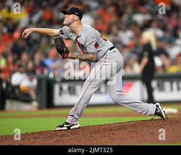 Boston Red Sox pitcher Tanner Houck delivers with a tattoo showing