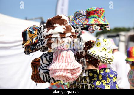 Bucket hats pictured for sale at a music festival in Wickham, Hampshire, UK. Stock Photo