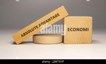Absolute advantage is written on a wooden surface. economy and business Stock Photo