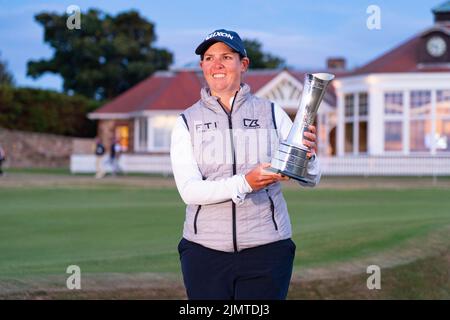 Gullane, Scotland, UK. 7th August 2022. Final  round of the AIG Women’s Open golf championship at Muirfield in East Lothian. Pic; Ashleigh Buhai of South Africa celebrating holing the winning putt on 4th extra hole to win the AIG Women’s Open at Muirfield this evening. She beat In Gee Chun of South Korea on the 4th extra hole in a playoff after both players finished ten under par. Iain Masterton/Alamy Live News Stock Photo
