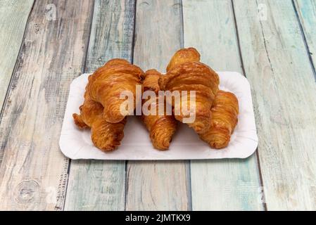 The word croissant defines a piece of bakery for the first time in the French Littré dictionary, but the croissant was already cited as a common roll Stock Photo