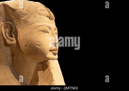 Egyptian archaeology. Ancient Sphinx in sandstone representing the pharaoh, copy space. Stock Photo