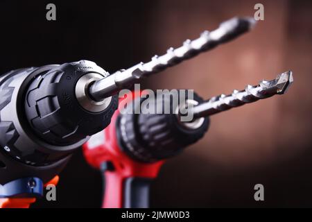 Composition with two cordless drills also working as screw guns Stock Photo