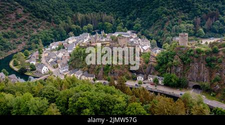 Drone view of the picturesque village of Esch-sur-Sure on the Sauer River in northern Luxembourg Stock Photo