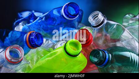 Empty colored carbonated drink bottles. Plastic waste Stock Photo