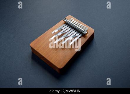 Traditional wooden kalimba isolated on black Stock Photo