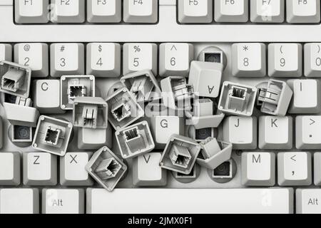 Heap of removed keys from a keyboard laying on the keyboard Stock Photo ...