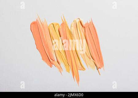 Flat lay yellow paint brush strokes Stock Photo