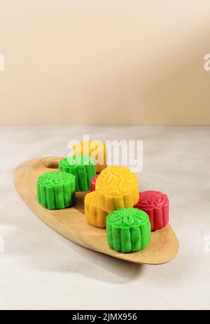 Snowskin Moon Cake. New Variation of Mooncake, Mochi Dough Filled Custard, Red Bean or Mung Bean Paste. Moulded in Mooncake Mould. Copy Space, Selecte Stock Photo