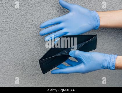 Close up hands holding empty wallet Stock Photo