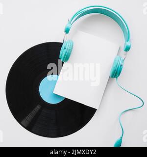 Booklet mockup with headphones vinyl Stock Photo