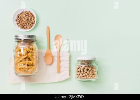 Assortment zero waste products green background with copy space Stock Photo