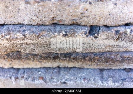Texture of gray concrete with granite stones. gray abstract background. Close up. Natural stone texture. Stock Photo