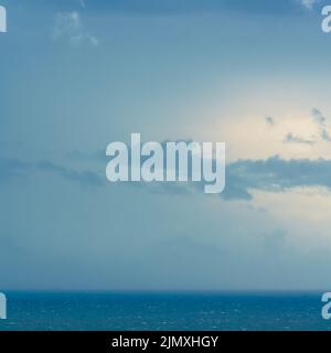 Dark blue clouds and sea. storm, dramatic seascape Stock Photo