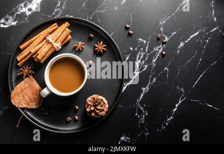 Top view tray with cup coffee cinnamon sticks Stock Photo