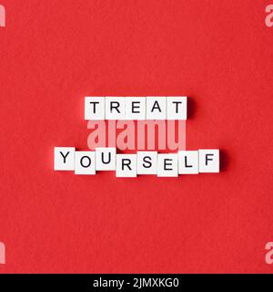 Top view letter cubes red background Stock Photo