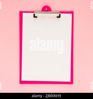 Top view clipboard mock up with pink background Stock Photo
