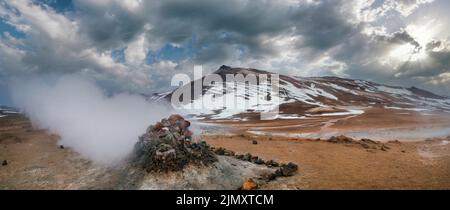 The Namafjall Geothermal Area, Iceland, on the east side of Lake Myvatn. At this area, also known as Hverir, are many smoking fu Stock Photo