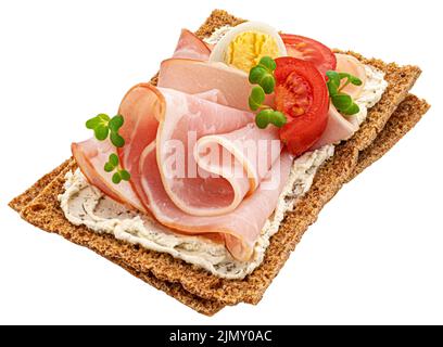 Crispbread with smoked ham isolated on white Stock Photo