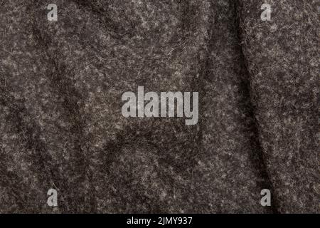 gray felt folded with a coarse structure Stock Photo