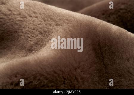 brown fur blanket loosely laid Stock Photo