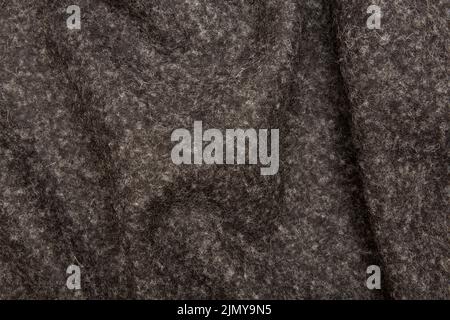 gray felt folded with a coarse structure Stock Photo