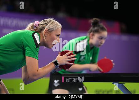 Wales' Charlotte Carey and Anna Hursey in the Women's Doubles Bronze Medal Match at The NEC on day eleven of the 2022 Commonwealth Games in Birmingham. Picture date: Monday August 8, 2022. Stock Photo