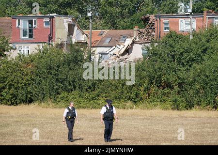 Emergency services at the scene in Galpin's Road in Thornton Heath, south London, where the London Fire Brigade (LFB) report that a house has collapsed amid a fire and explosion. Picture date: Monday August 8, 2022. Stock Photo