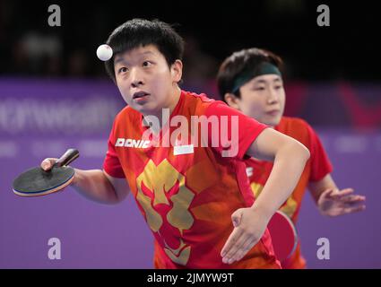 Singapore's Jian Zeng and Tianwei Feng in the Women's Doubles Gold Medal Match at The NEC on day eleven of the 2022 Commonwealth Games in Birmingham. Picture date: Monday August 8, 2022. Stock Photo