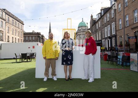 Edinburgh. Scotland, UK. 8th Aug, 2022. Photocall: Launch of Kostya Benkovich's new sculpture The Suitcase highlighting the plight of refugees worldwide. The sculpture is made from reinforced steel, which is also used to make prison bars in Russia. The Suitcase will be displayed at Assembly Rooms, George Street, Edinburgh from 8th - 29th August. Entry is free. Pictured: (L-R) Kostya Benkovich, Lezley Marion Cameronand  Alexandrina Markvo. Pic Credit: Pako Mera/Alamy Live News Stock Photo