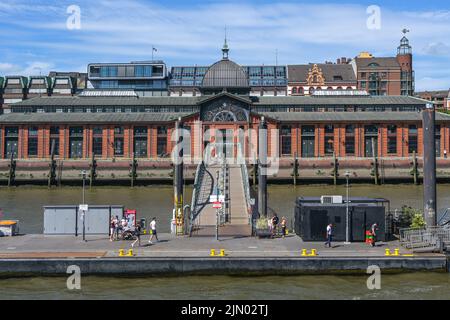 Hamburg, Germany, August 3, 2022: Historic fish auction hall in Altona beside the famous fish market, today the building is used for events, red brick Stock Photo