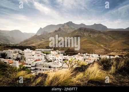 Panoramic view of the tourist town of Agaete and the mountains of Tamadaba Rural Park in the background, Gran Canaria, Canary Islands, Spain Stock Photo